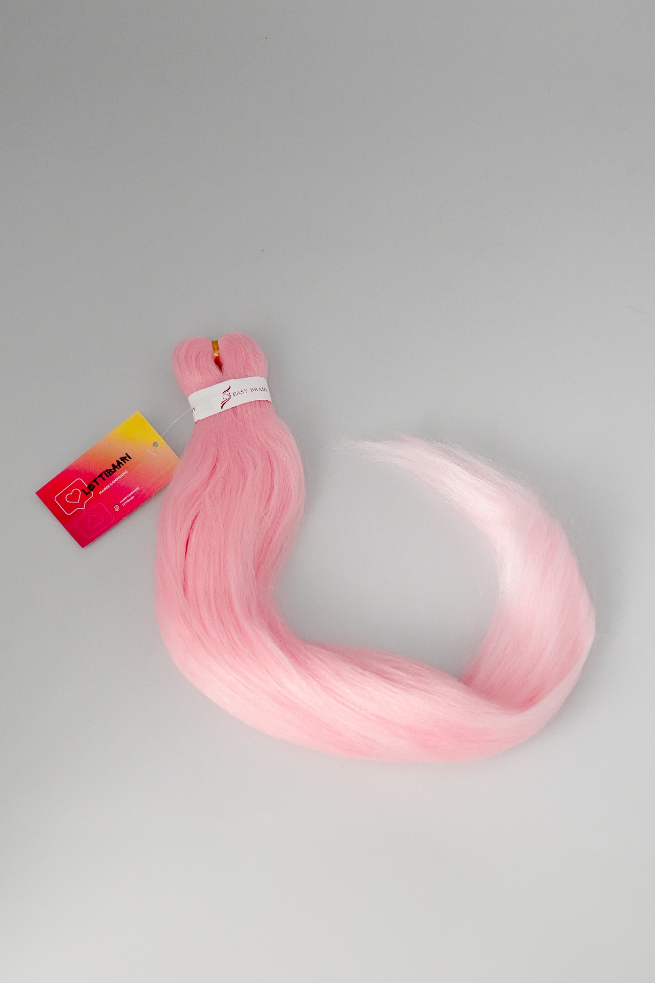 Vaalean punainen lyhyt kuituletti